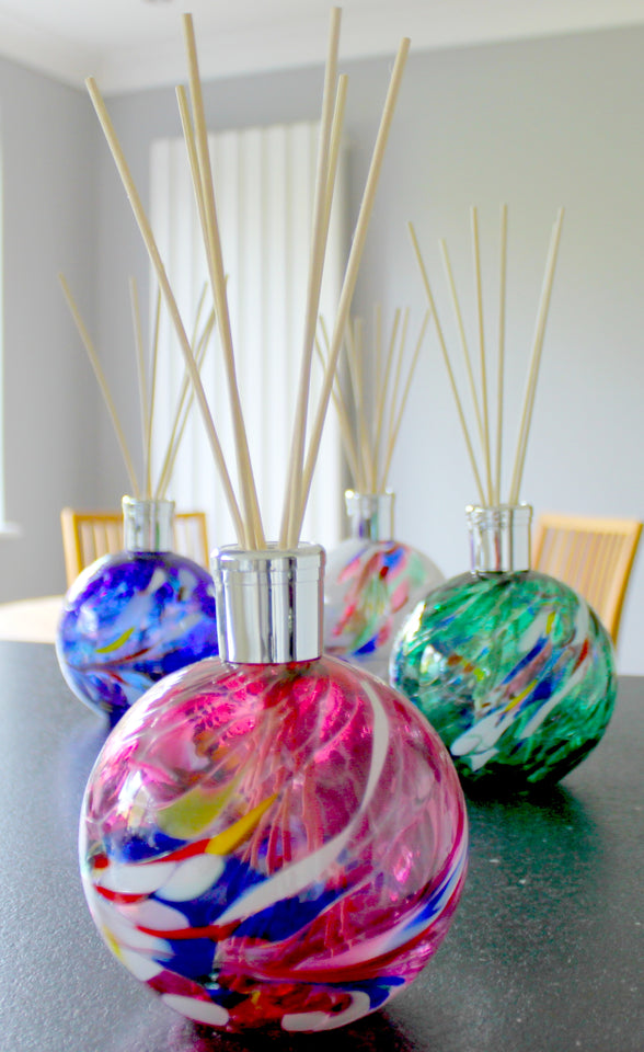 Group of D & J Glassware Scent reed diffusers in pink amethyst, green, blue and white