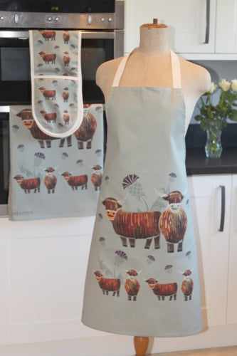 kitchen textile collection with highland cow design