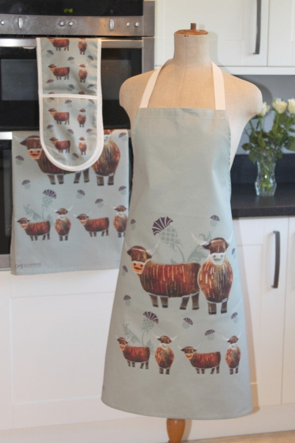 kitchen textile collection with highland cow design